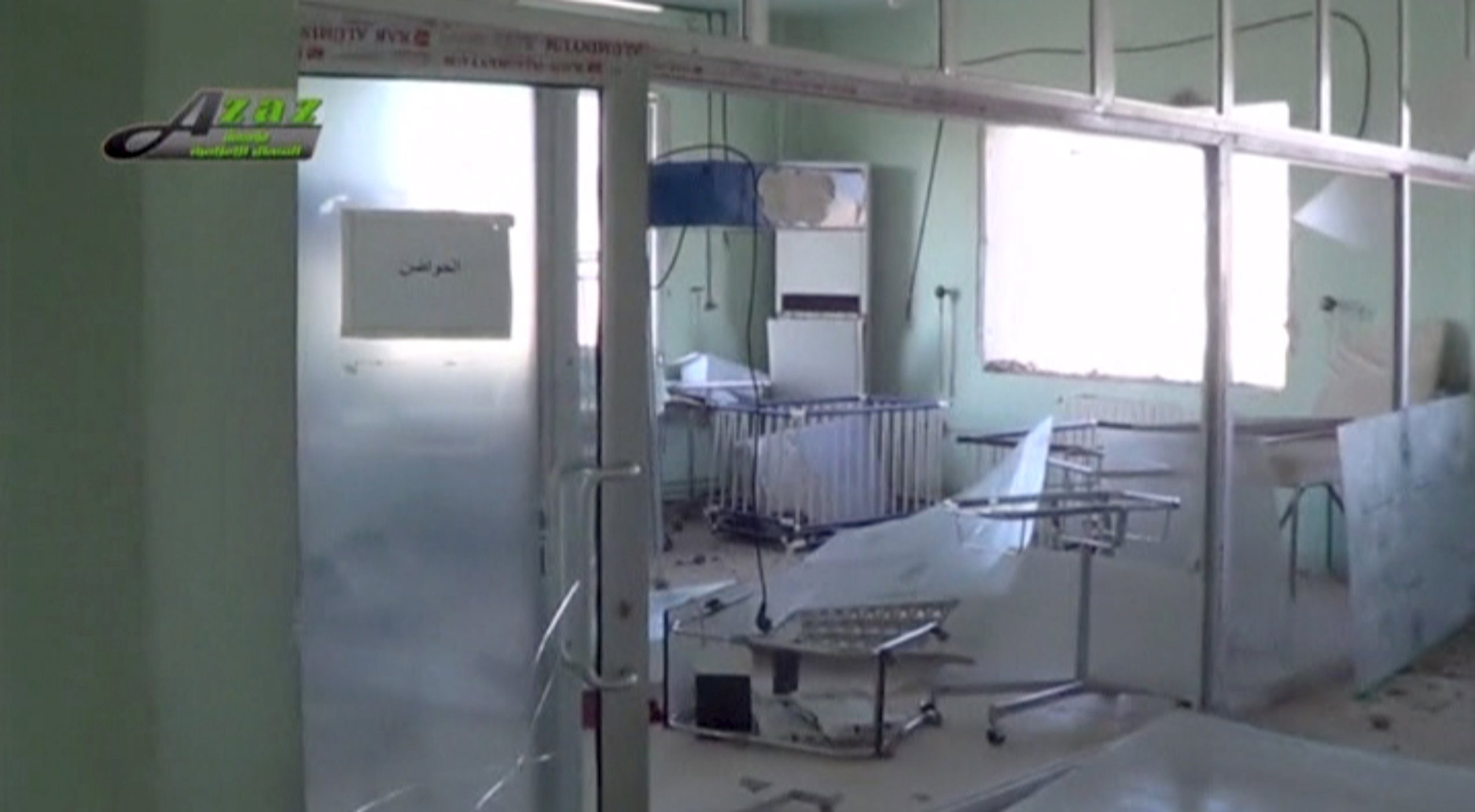 Still image taken from video shows the view of the damaged interior of what is said to be a hospital after a missile attack in Azaz
